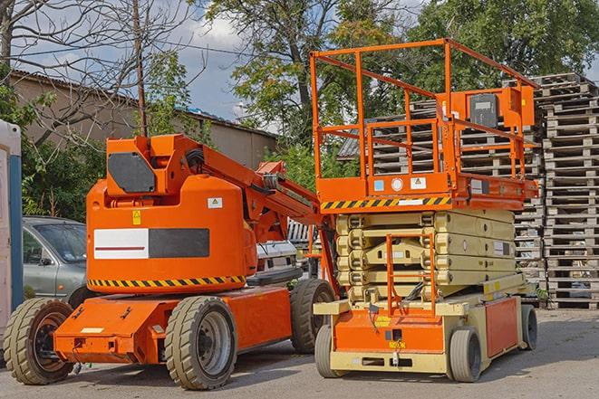 forklift operator moving goods in warehouse in Newtonville